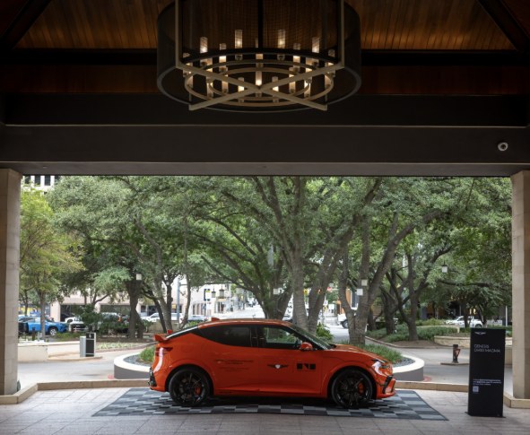 GV60 Magma parked under the Four Seasons porte-cochère
